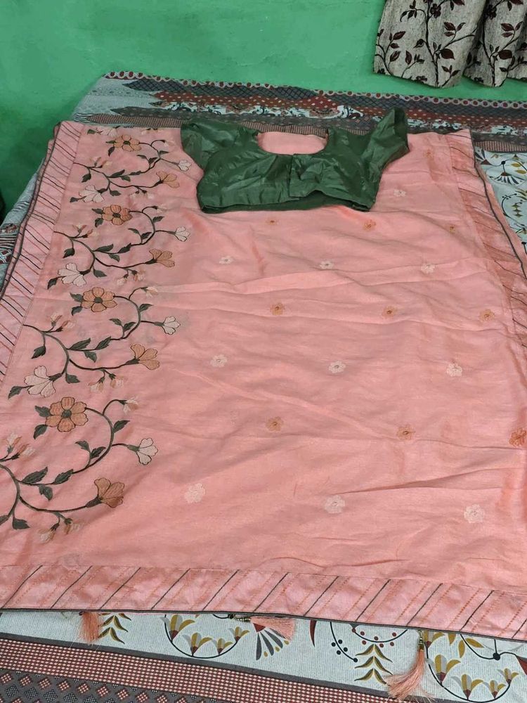 Elegant Pink Saree with Floral Embroidery
