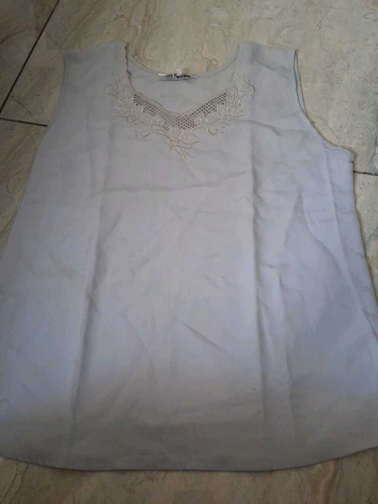 Elegant Sleeveless top with Embroidery