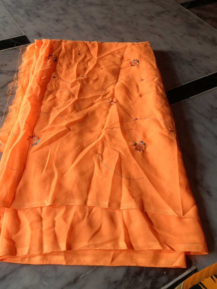 Vibrant Orange Saree with Delicate Floral Motifs