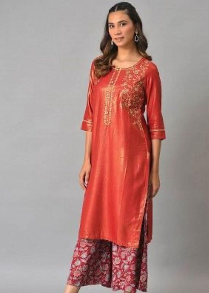 Elegant Orange Embroidered Kurta Set