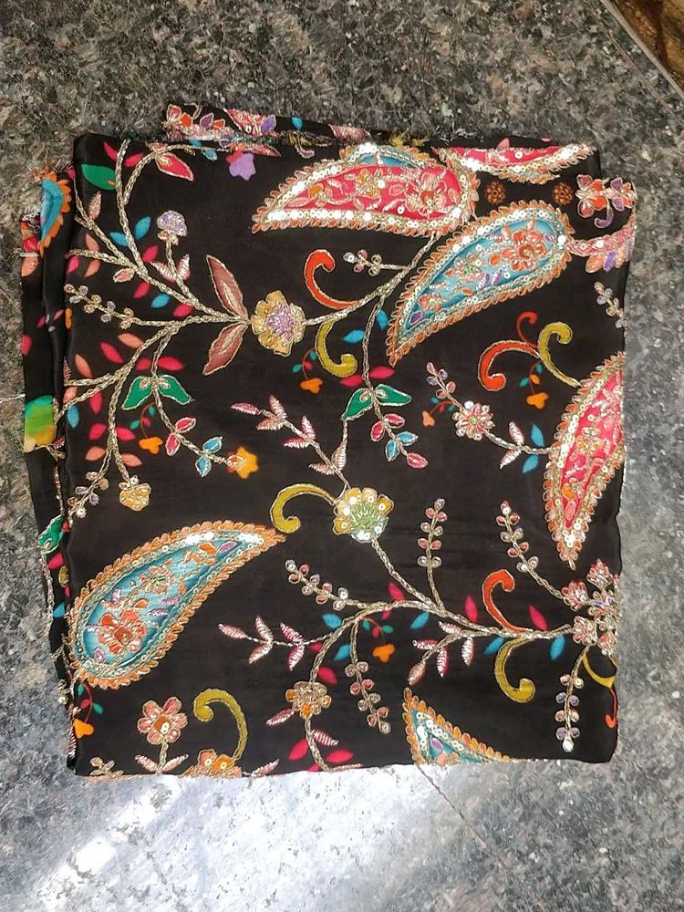 Embroidered black material -1 Metre