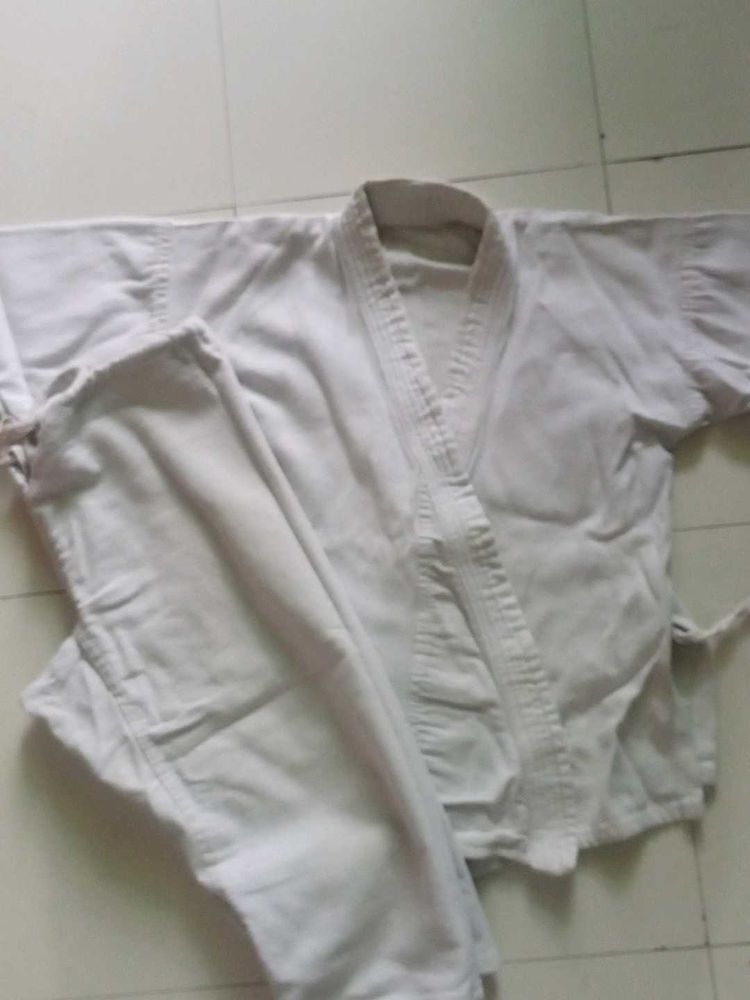 White Karate dress with L guard supporter