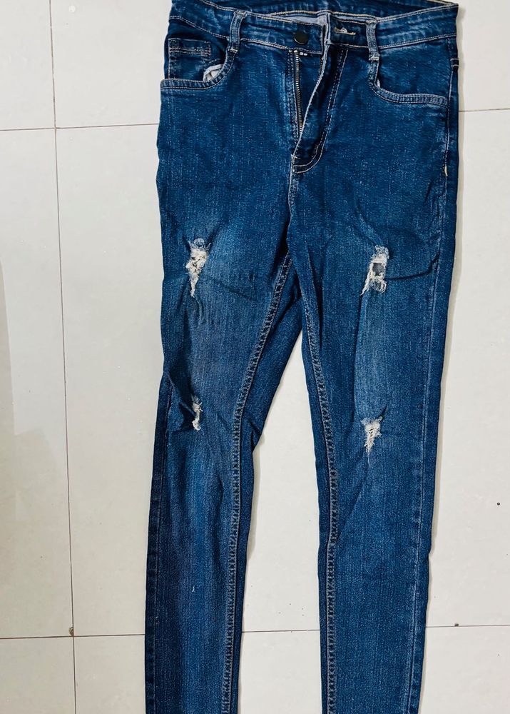 Ripped Blue Denim Jeans
