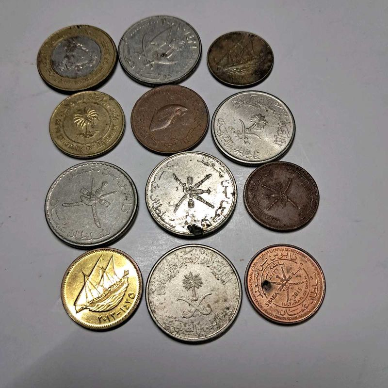 12 assorted Gulf Country coins