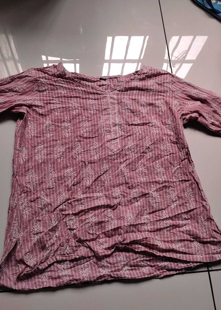 pink short kurtha with white print