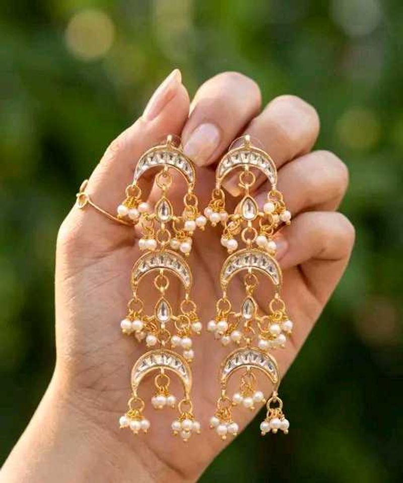 Elegant light weight Gold Jhumka in heavy look