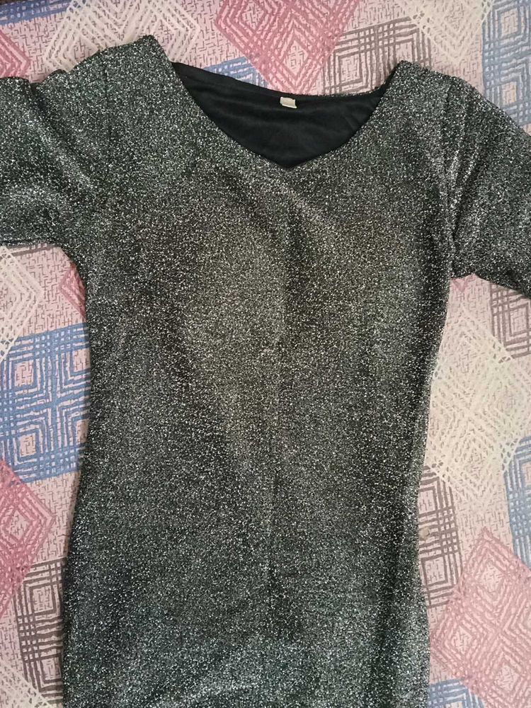 This is a grey stretch knit metallic long party dr