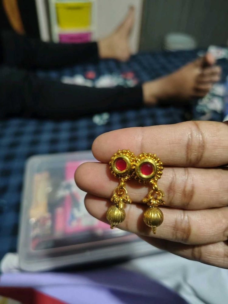 Gold Tone Dangle Earrings with Red Stone