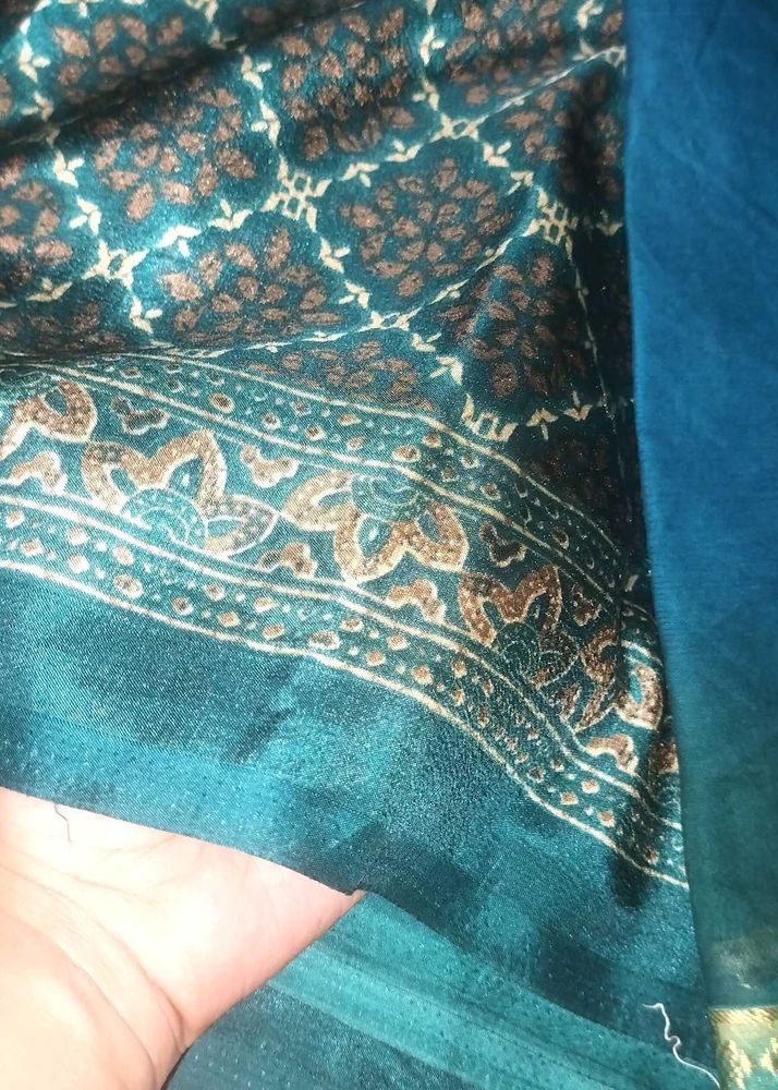 Elegant Teal Saree with Traditional Print