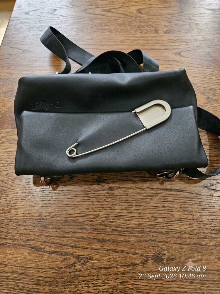 Daze Black Faux Leather Crossbody Bag with big saf