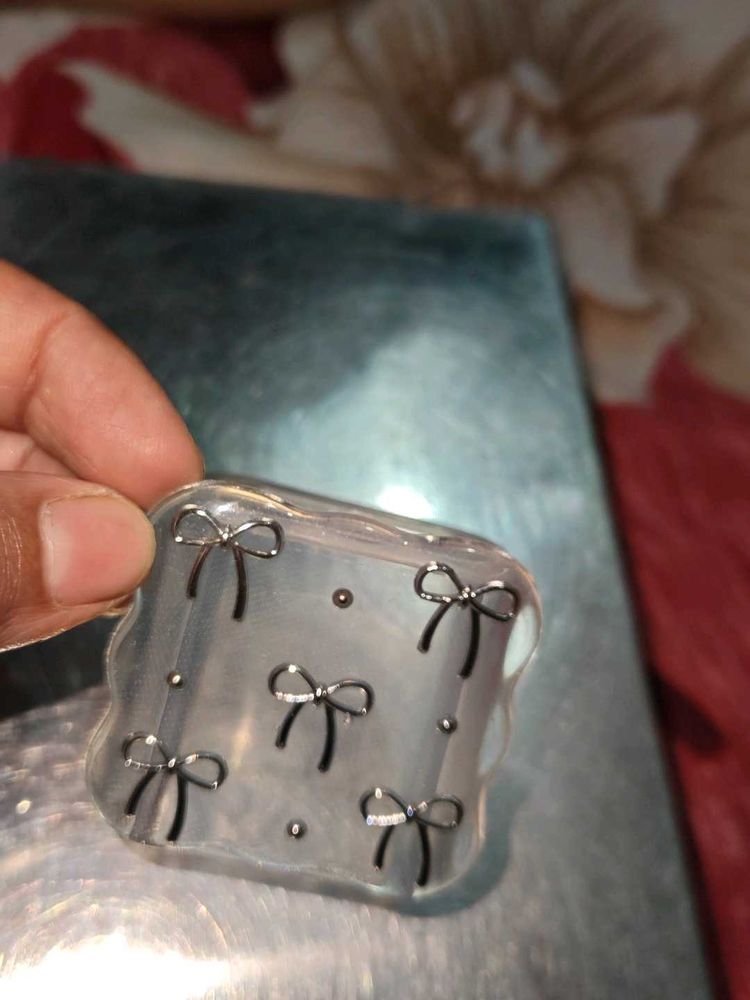 I phone charger cover bow pattern