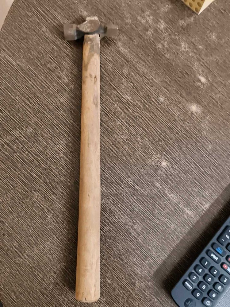 Hammer with wood stick
