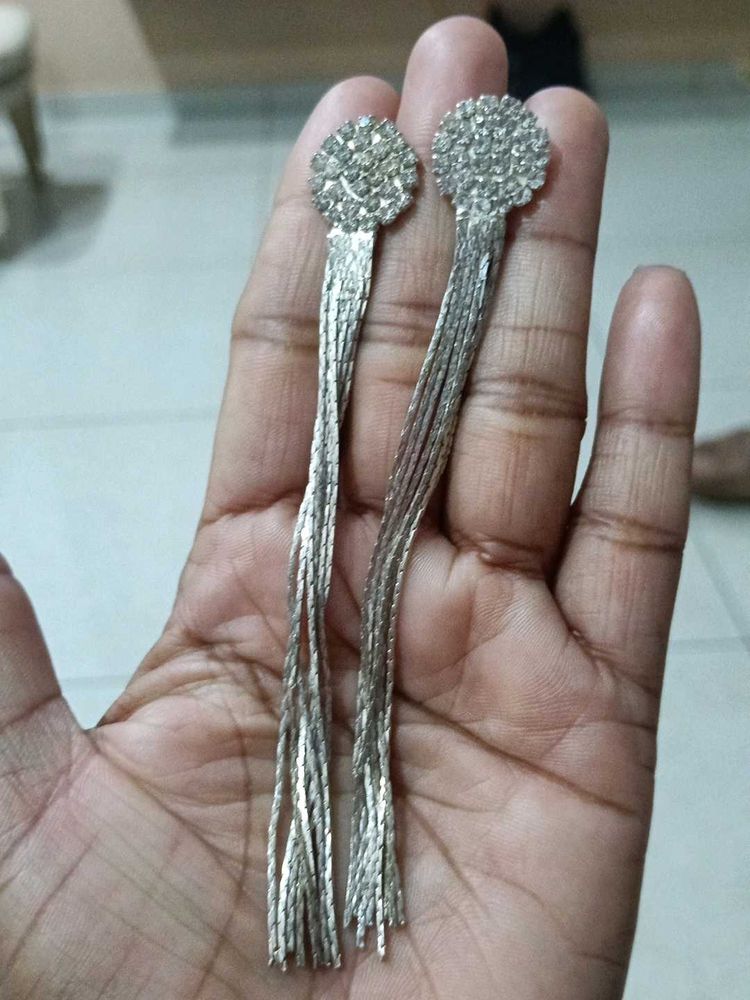 silver toned crystal studded long chain tassel dro