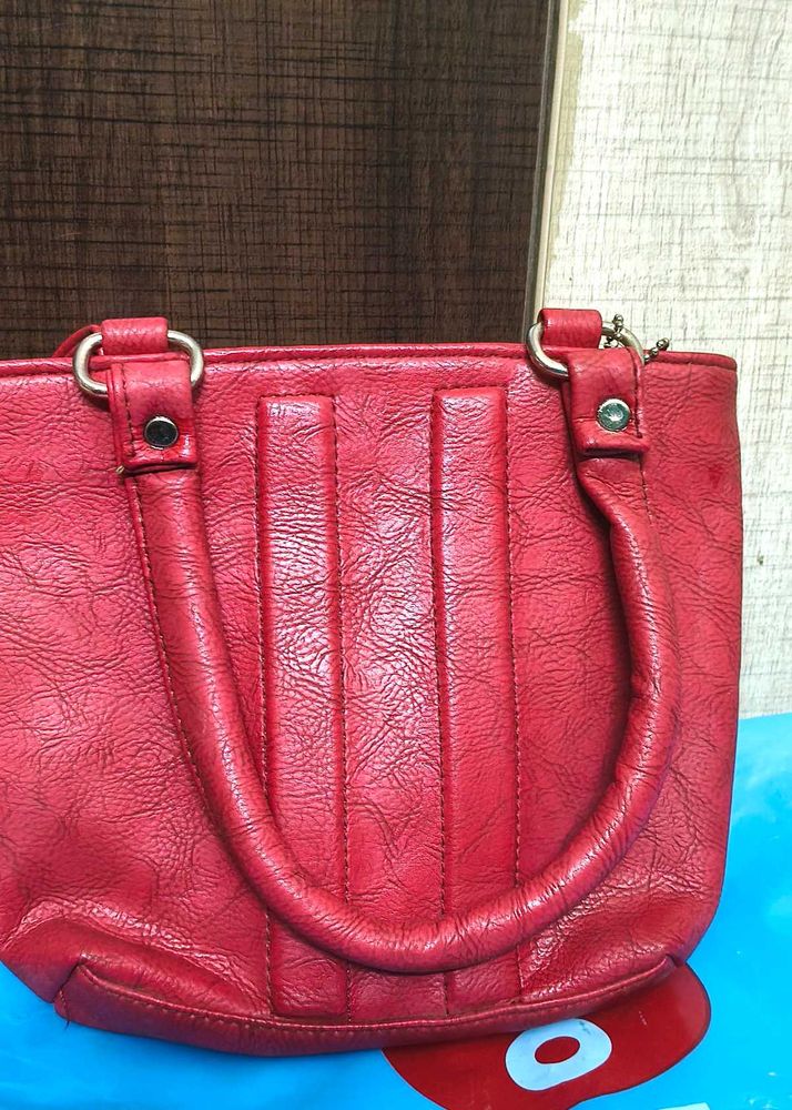 Maroon small handbag