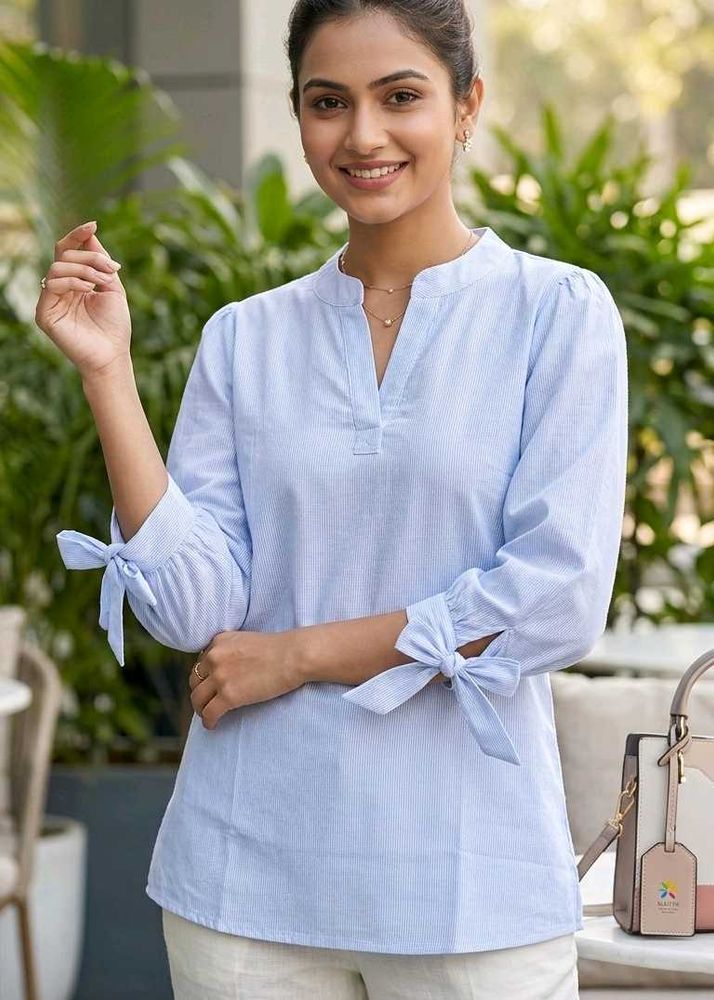 Chic Blue Cotton Top with Bow Sleeves