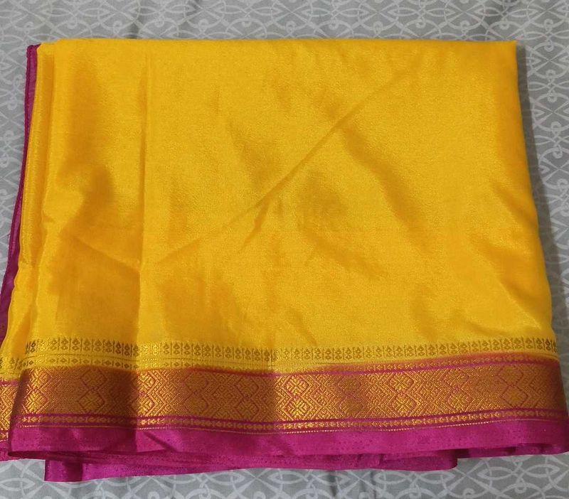 Vibrant Yellow Saree with Pink Border