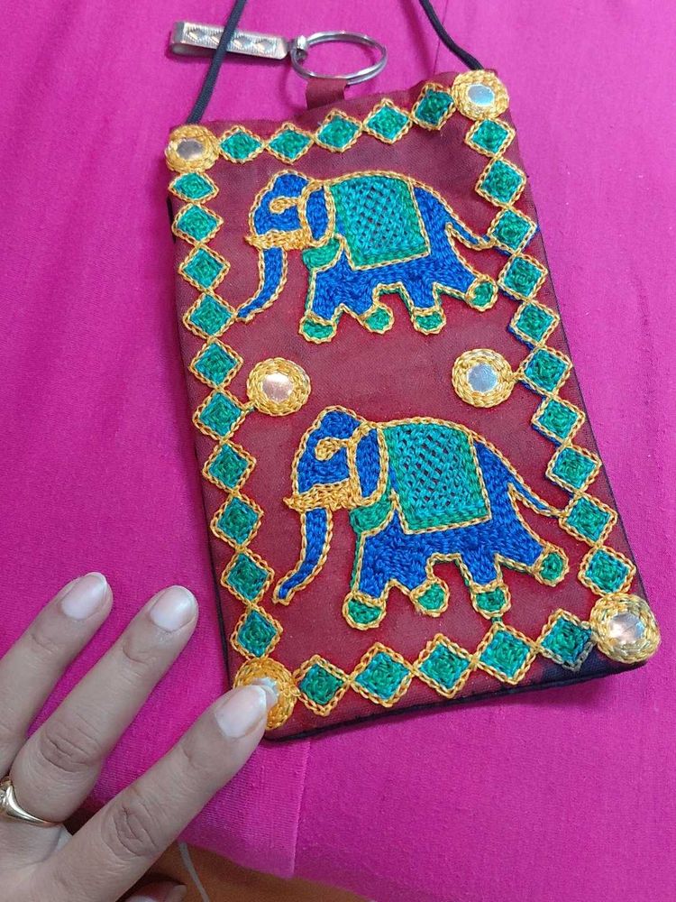 Embroidered elephant phone pouch ..