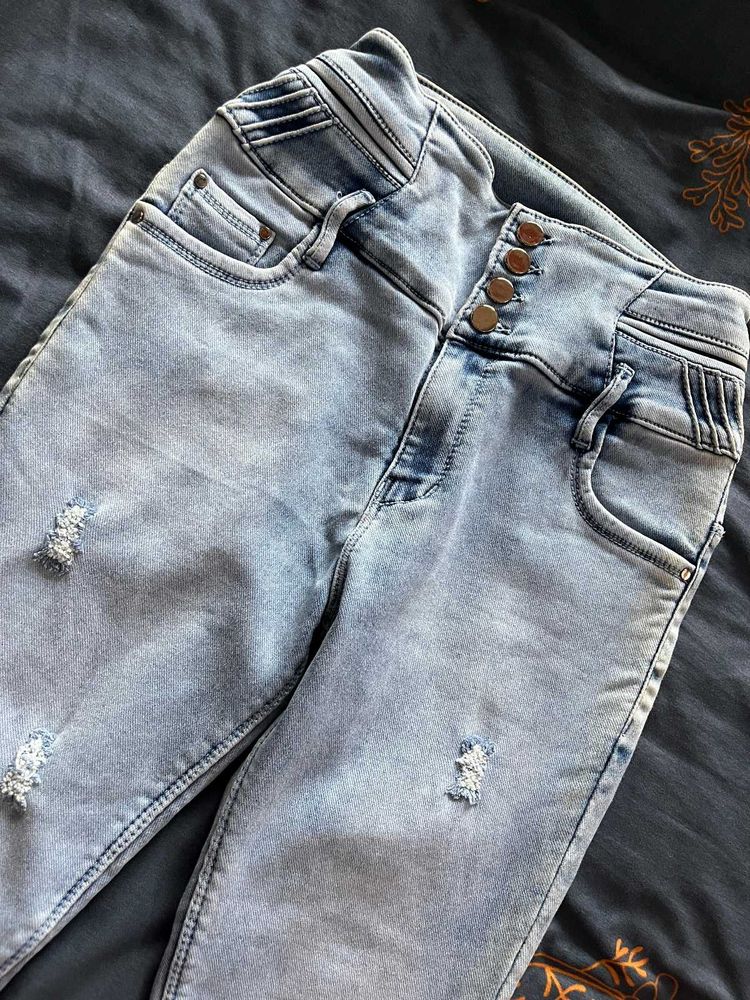 Ripped Light Wash Denim Jeans