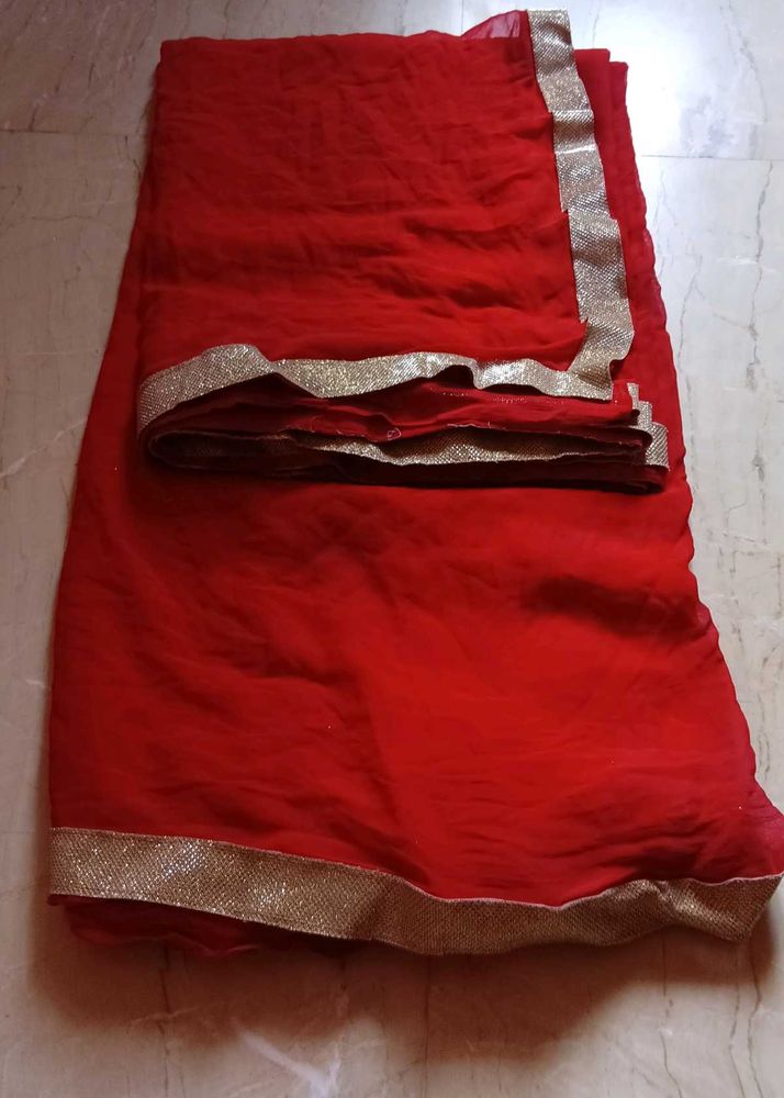 Elegant Red Saree with Gold Border