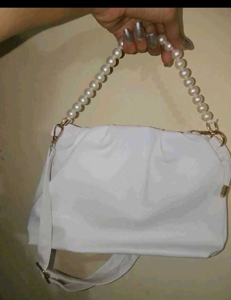 Clutch with Pearl Handle