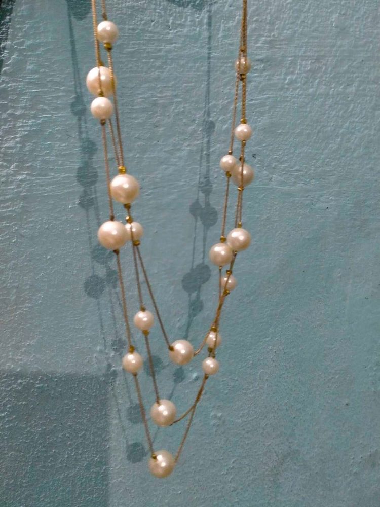Pearl layer neckpiece
