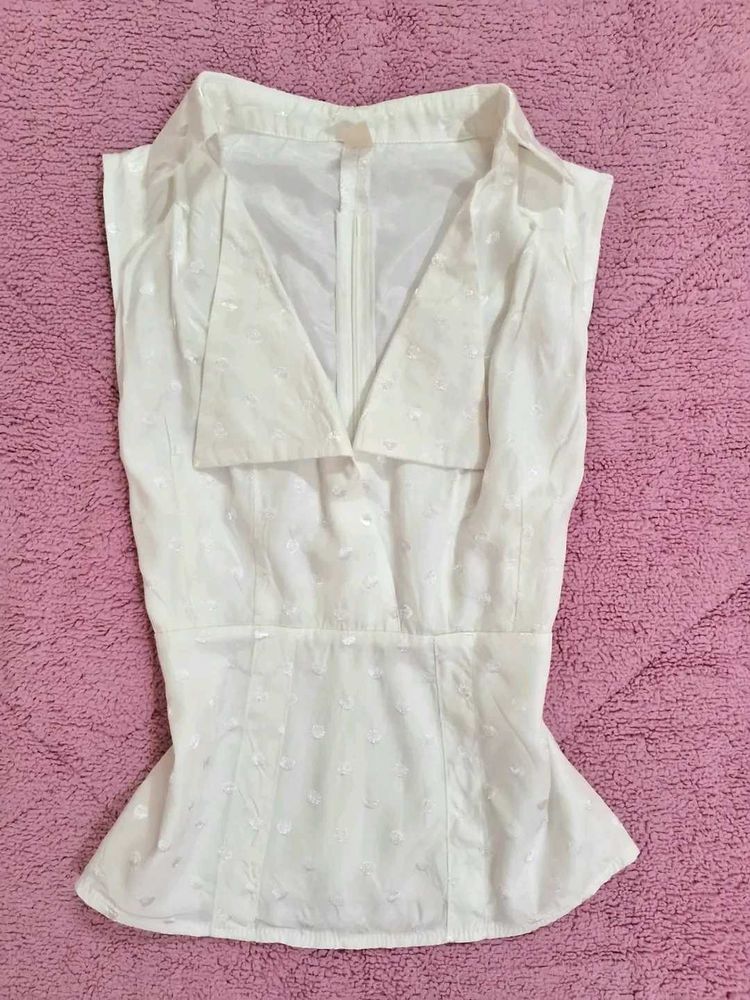 Elegant White Sleeveless Blouse