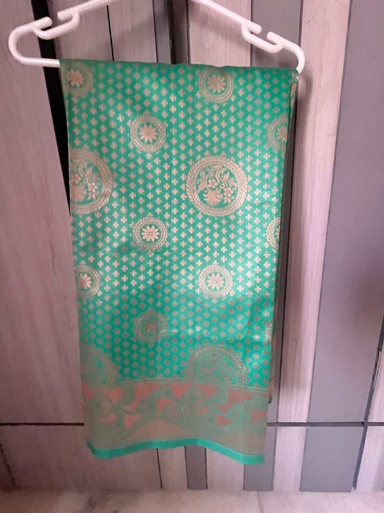 Green Brocade Silk Saree with blouse piece