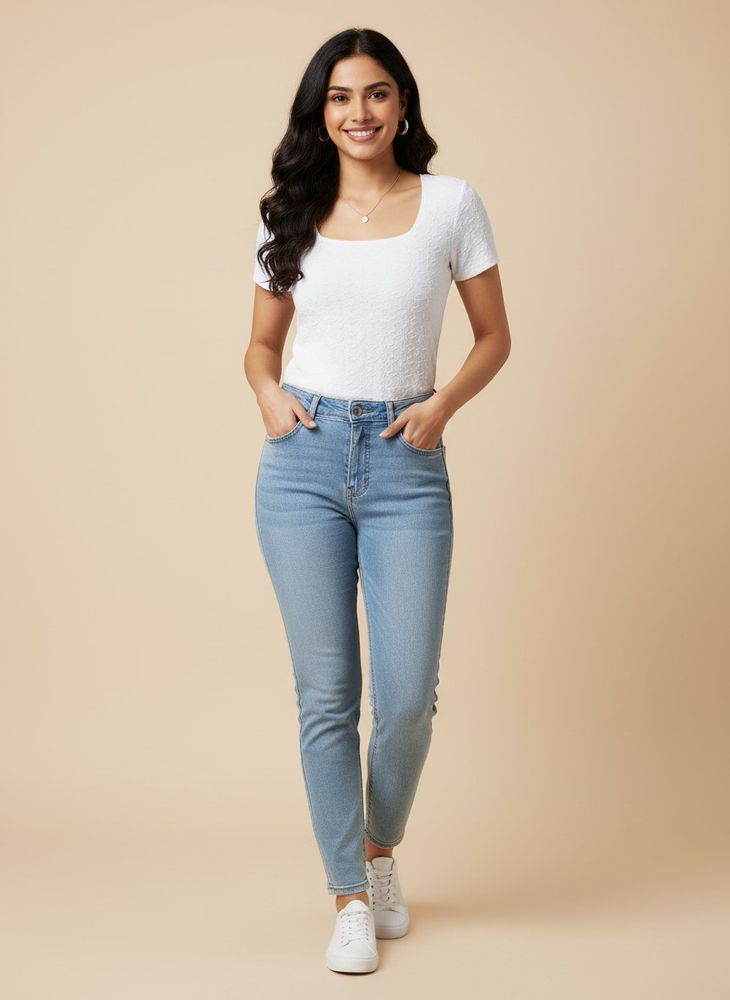 White, short-sleeve top with a textured pattern