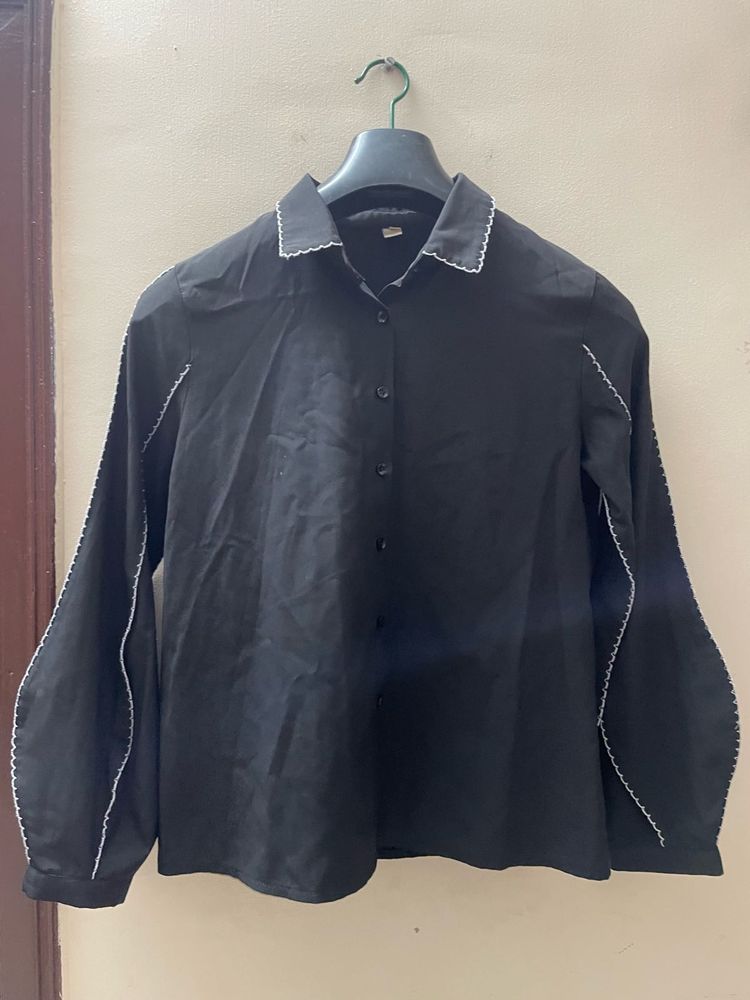 Black statement shirt with white detailing