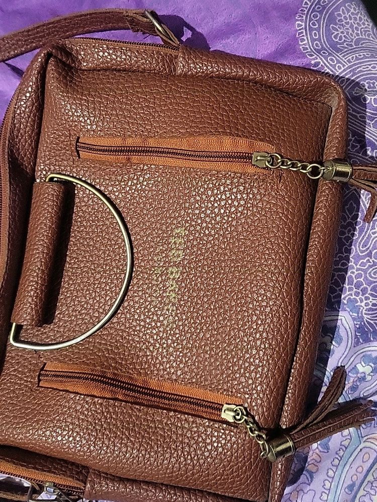 Sling Bag In Dark Brown Color Not Used New Item Very Spacious Have Multiple Sections