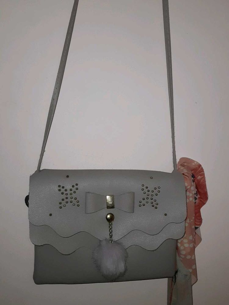 Grey Bow Detail Crossbody Bag with Pom Po