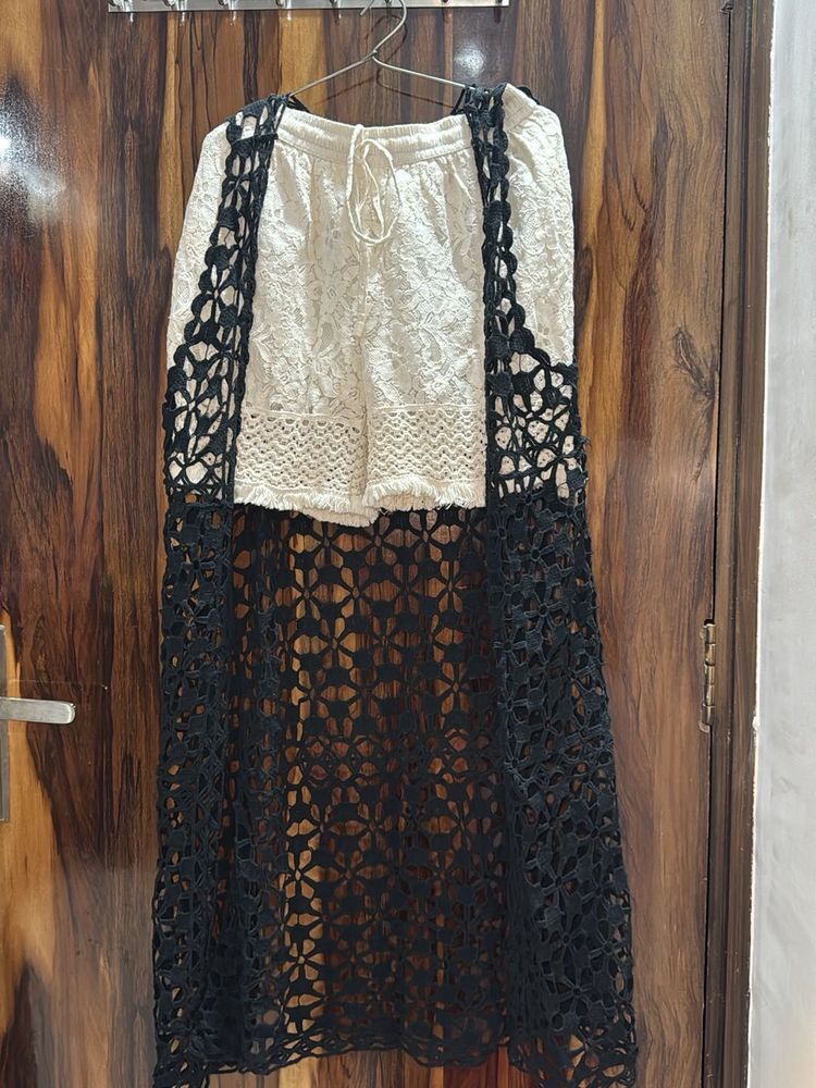 black shrug with white shorts