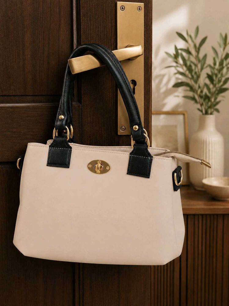Elegant Beige Handbag with Black Handles
