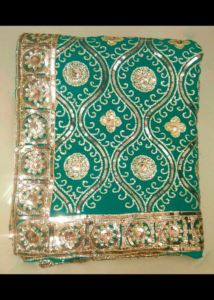 Elegant Sequined Teal Sari