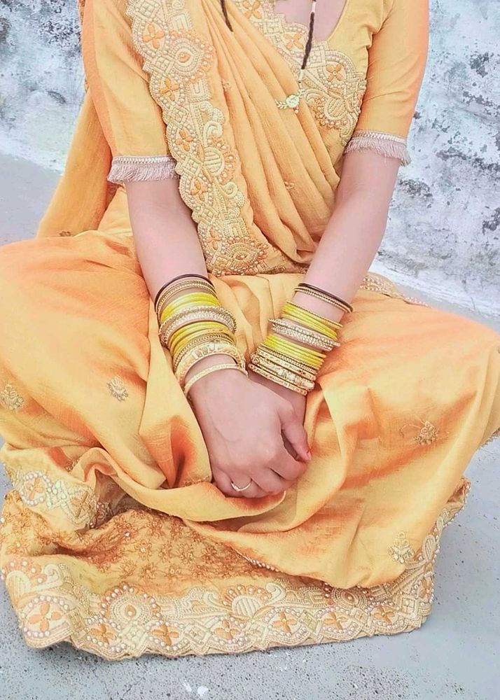 Elegant Yellow Saree with Embellishments
