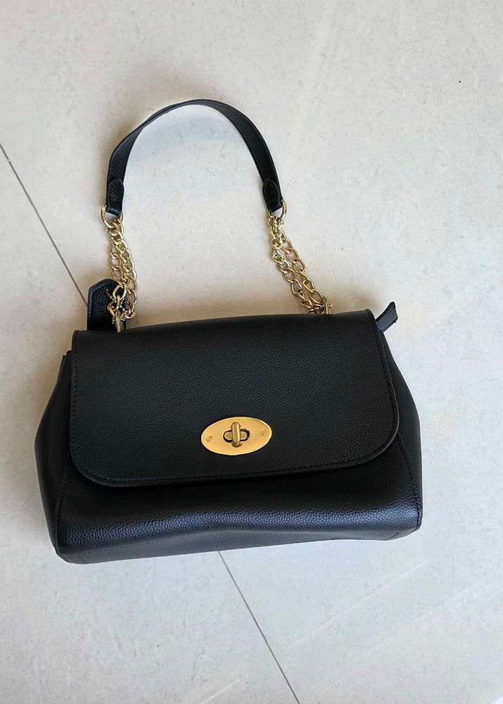 Chic Black Handbag with Gold Chain