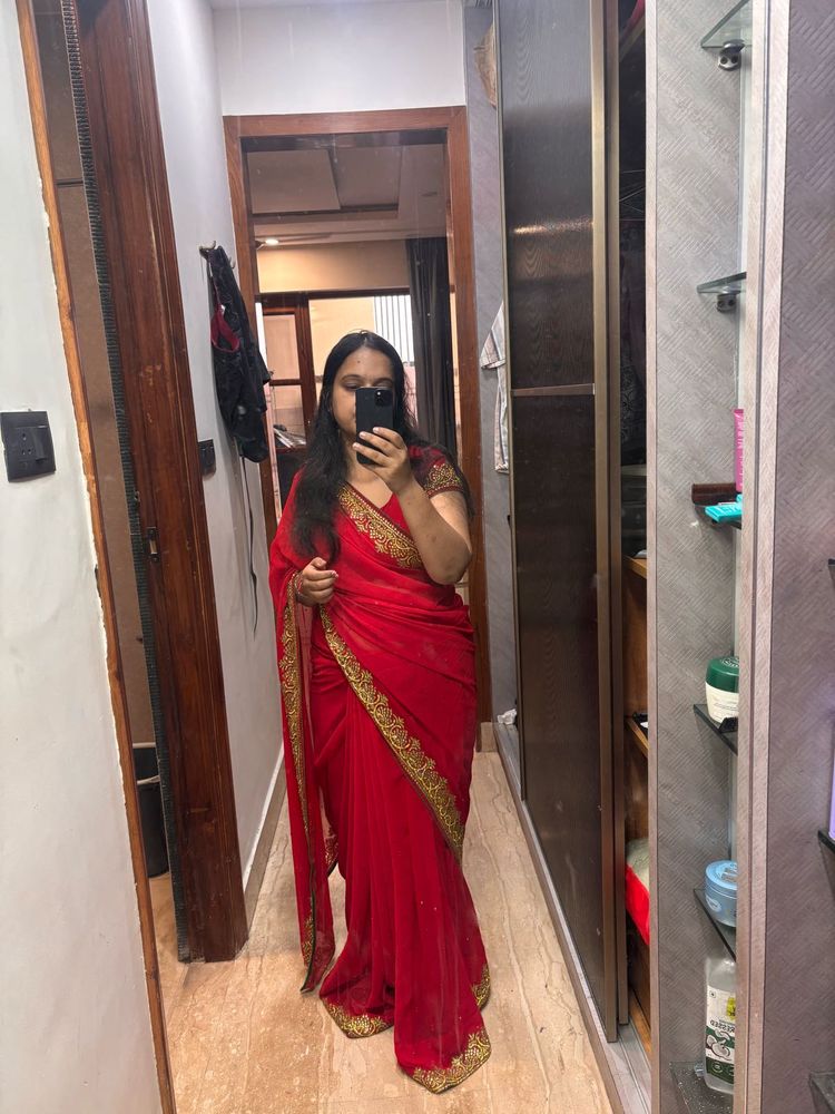 Elegant Red Saree with Golden Border