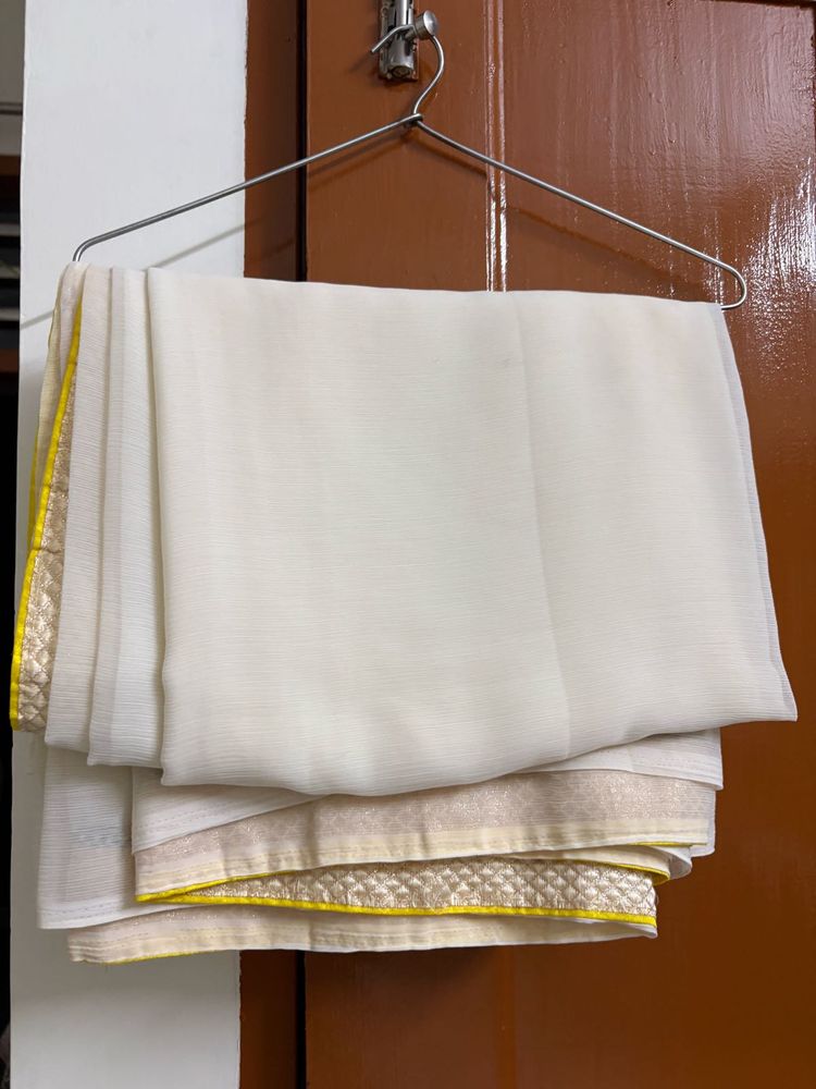 Elegant Cream Saree with Golden Border