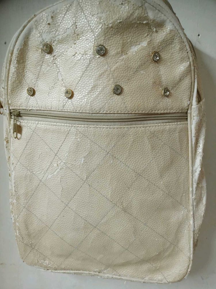 Quilted Backpack with Embellishments