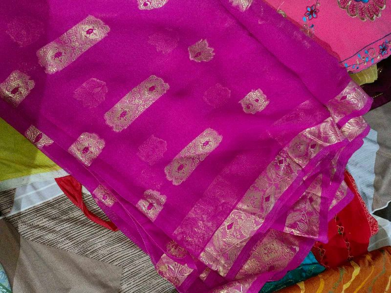 Vibrant Pink Saree with Gold Motifs