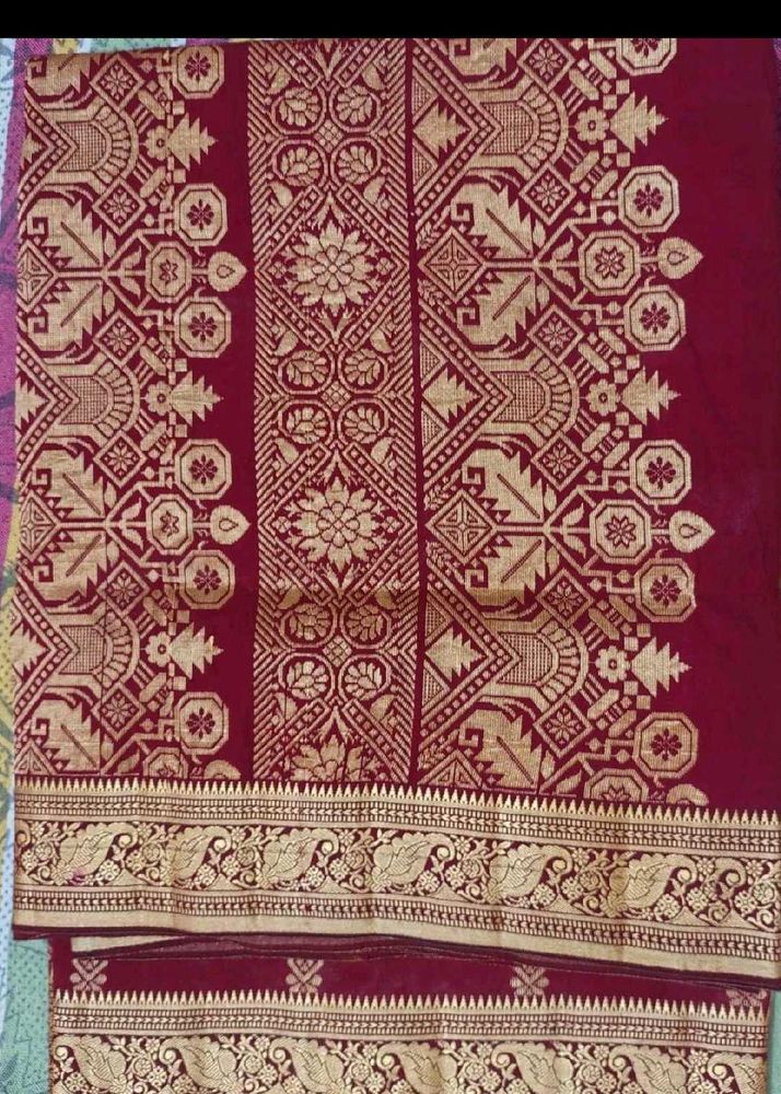 Elegant Maroon and Gold Saree