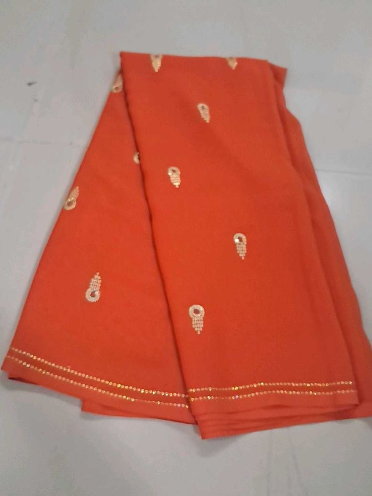 Beautiful Orange Saree with Embellishments