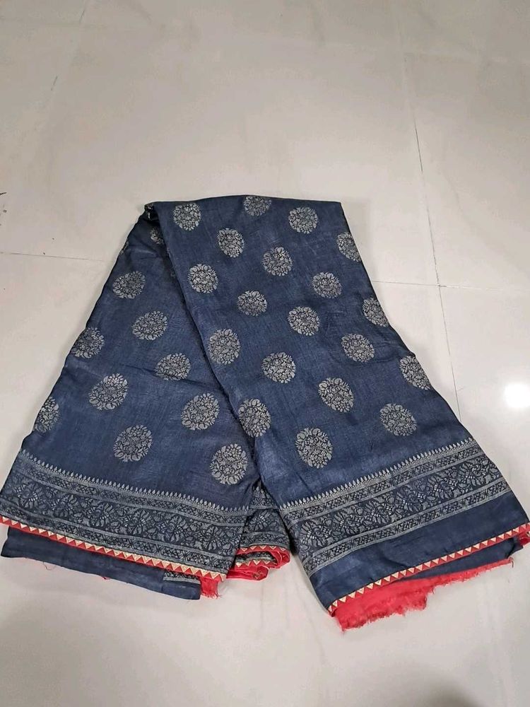 Elegant Blue Saree with Intricate Pattern