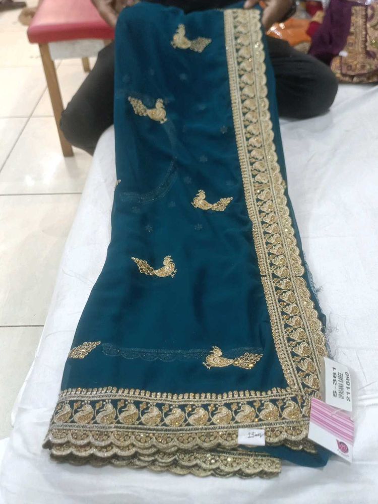 Stunning Teal Saree with Gold Embroidery