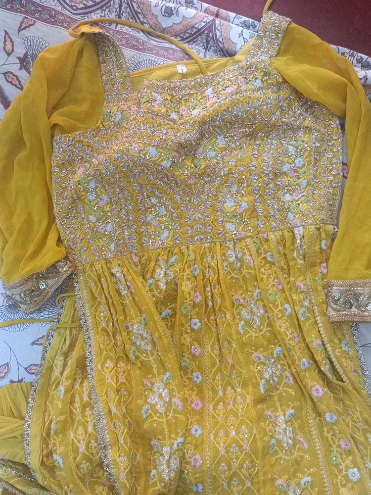 Nyra cutYellow Embroidered kurta Choli Set
