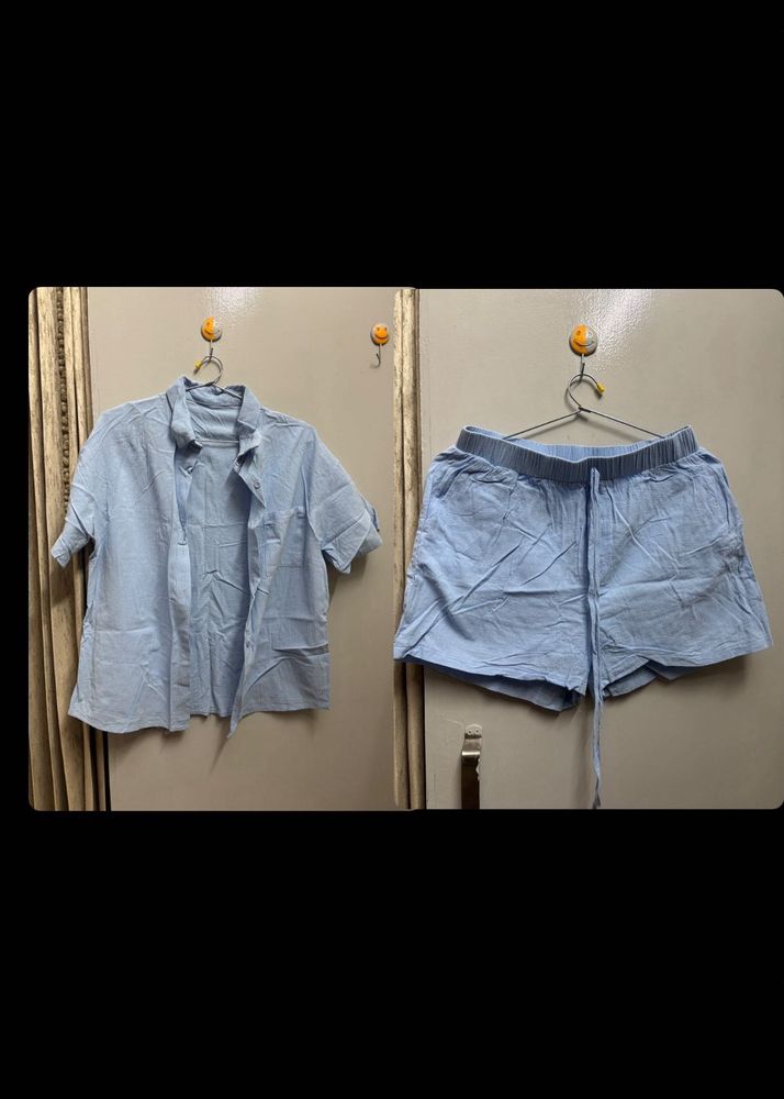 Light Blue Button-Down Shirt with shorts
