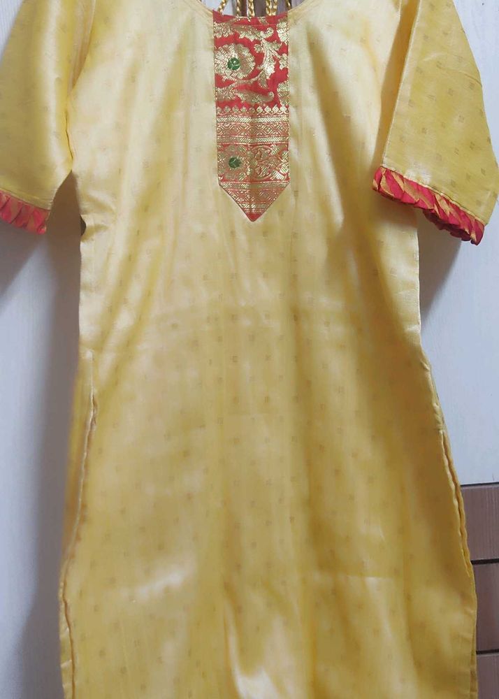 Elegant Yellow Kurta with Red Border