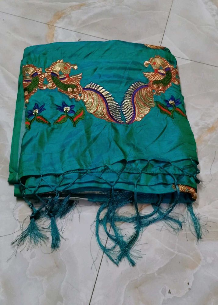 Elegant Teal Peacock Embroidered saree
