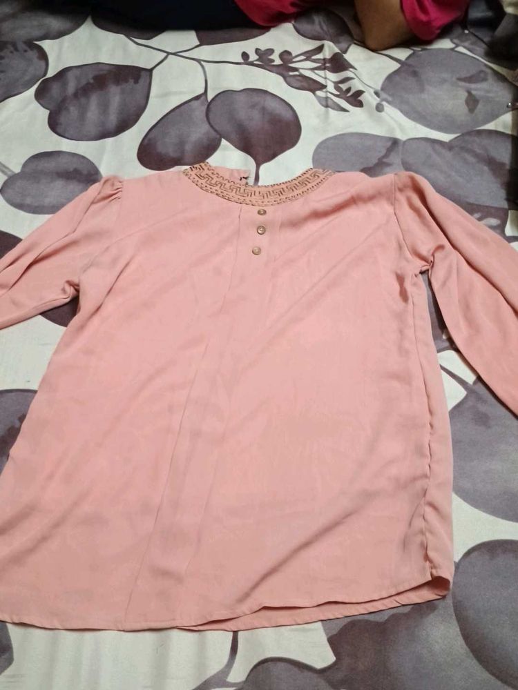 Elegant Peach top with Embellished Neckline