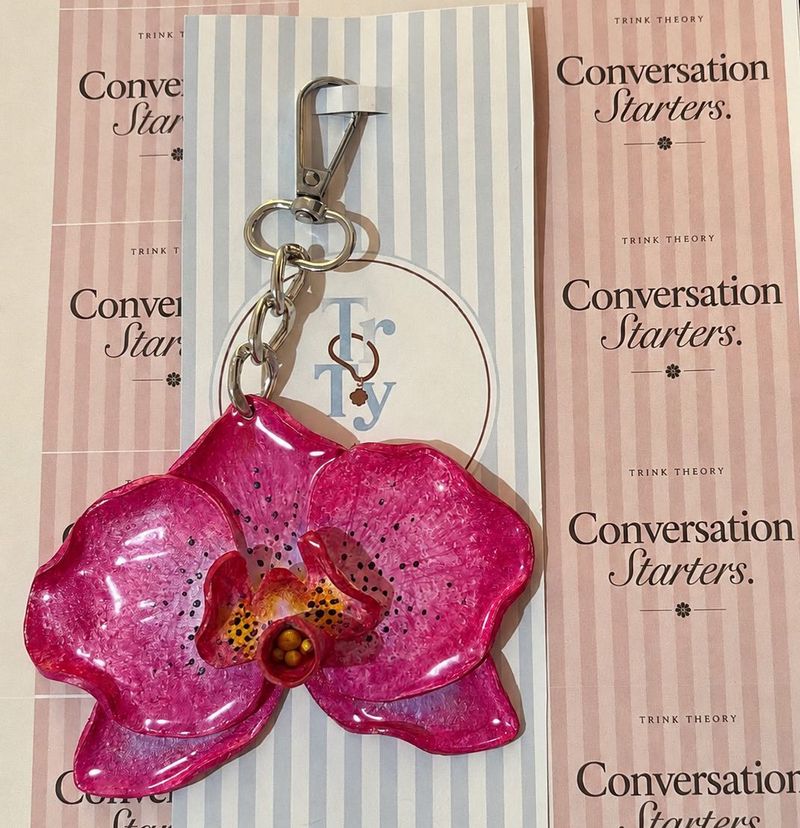 Handsculpted, hand painted, Orchid BAGCHARM